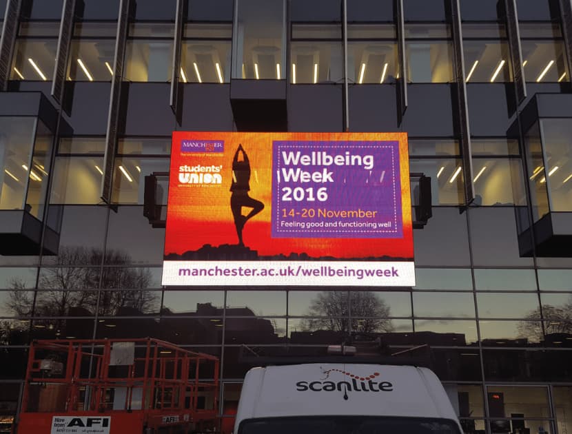 Wellbeing Manchester university advertisement LED sign