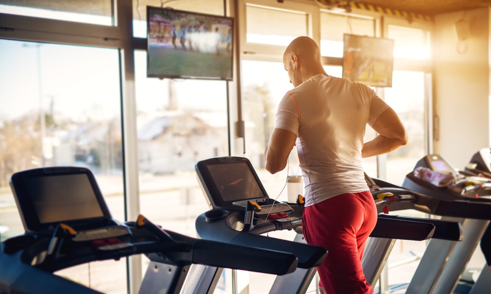 man exercising on treadmill