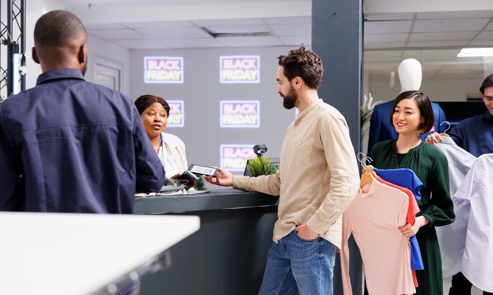 customers queuing in retail shop